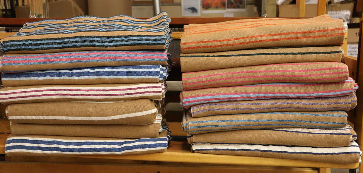 Sarepta Brown Cotton from Louisiana is a natural brown colored cotton. The Acadian style is derived from French textiles and popular in the Southern Louisiana culture. These are double bed size blankets woven from natural colored brown cotton and dyed cotton. A special project and each blanket is different.