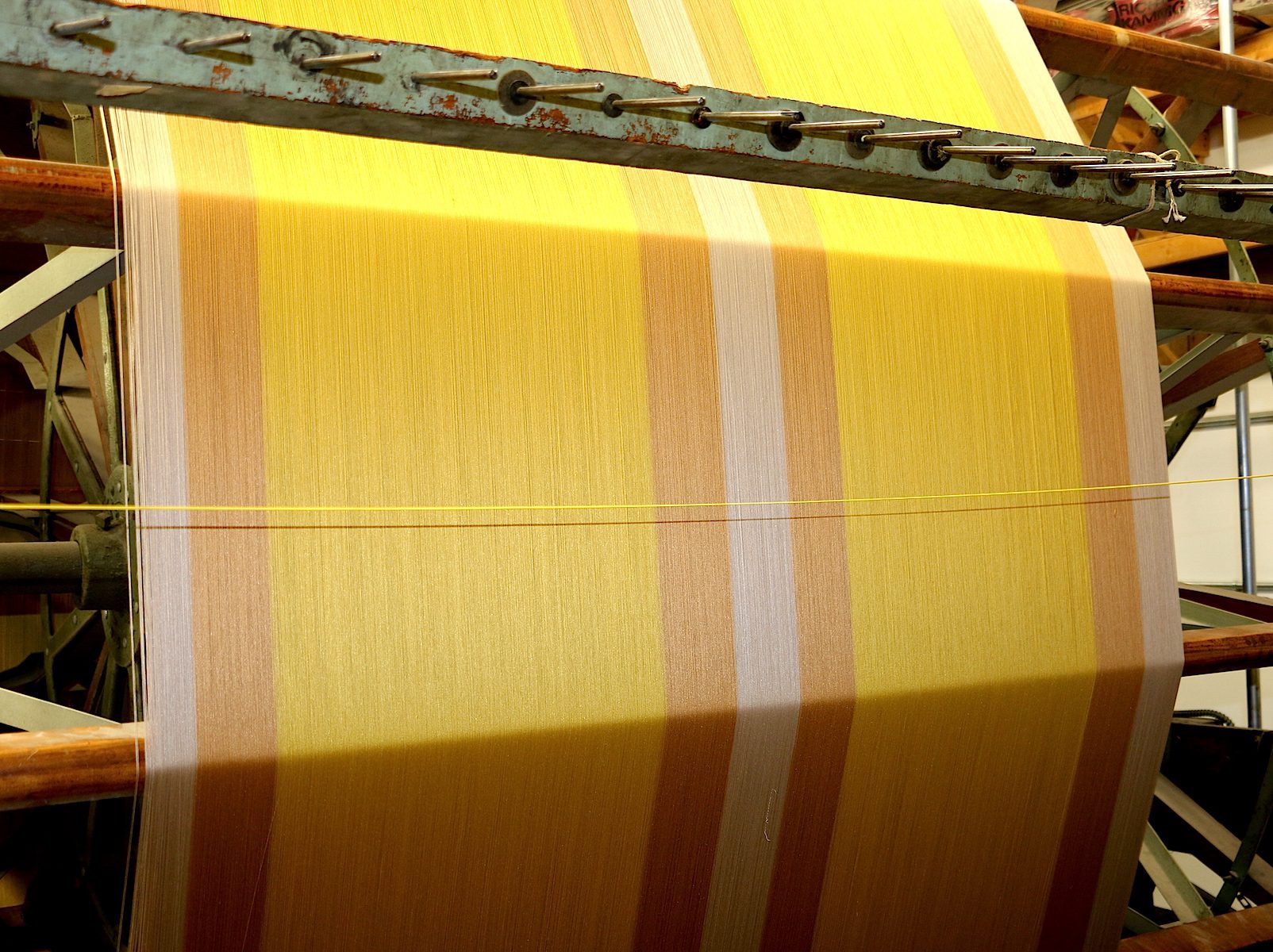 This is the silk warp for the Lincoln Damask for the drapery in the parlors at the Lincoln Home in Springfield IL. The pattern is created largely by the by the warp colors so we had to get the colors correct in a thread by thread sequence.