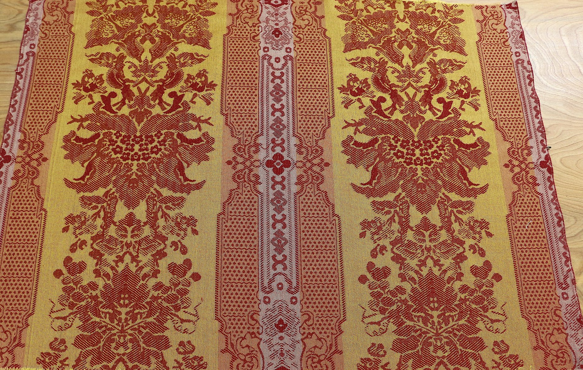 Reverse side of the Lincoln Parlor Damask.
This is a reproduction of the damask that was in use in the parlors at Lincoln's home in Springfield Il. We have changed the scale slightly to fit our jacquard loom harness. The warp is silk and the filling is worsted wool.