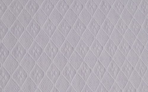 Close-up of Thomas Jackson Diamonds diaper dimity in white cotton
