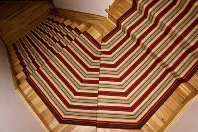 Our Venetian carpets can be installed on curving and complex staircases. Pie-shaped stairs and landings are no problem