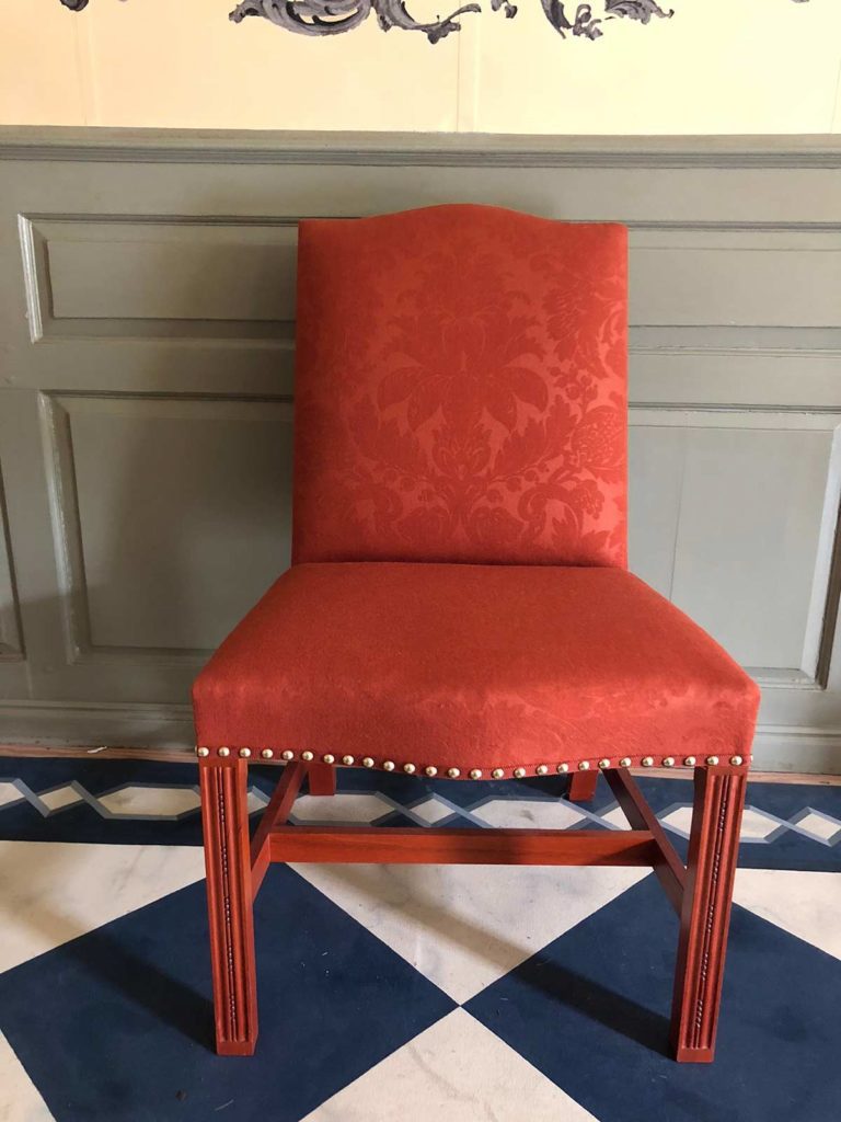 Another view of a chair at the Schuyler Mansion
covered in our copper embossed
damask.