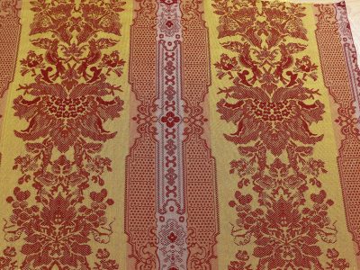 Reverse side of the Lincoln Parlor Damask.
This is a reproduction of the damask that was in use in the parlors at Lincoln's home in Springfield Il. We have changed the scale slightly to fit our jacquard loom harness. The warp is silk and the filling is worsted wool.