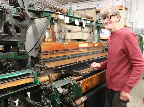 John is both a weaver and loom fixer at Thistle Hill Weavers. Here he is weaving on the Beekman 1802 version of the Lincoln shawls. The big S6 was built by Crompton and Knowles. We brought it up from South Boston, Virginia out of the Halifax Damask Mill.